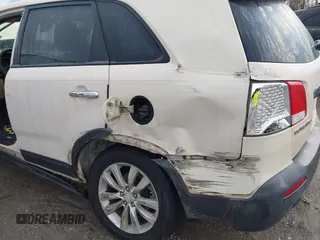 2011 Kia Sorento EX with VIN 5XYKU4A13BG003130, listed as a IAAI auction lot 41209337 with 162,058 mi miles. Bid and sale history available at carsss.com. Image 6.