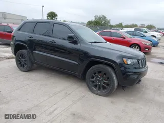 2018 Jeep Grand Cherokee Laredo E with VIN 1C4RJFAG7JC312948, listed as a IAAI auction lot 41624027 with 116,763 mi miles. Bid and sale history available at carsss.com. Image 1.