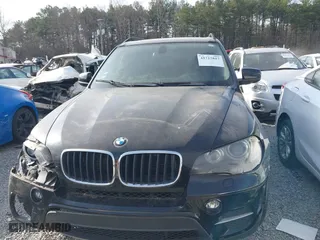 2011 BMW X5 35i with VIN 5UXZV4C58BL406373, listed as a IAAI auction lot 41715817 with 101,900 mi miles. Bid and sale history available at carsss.com. Image 12.