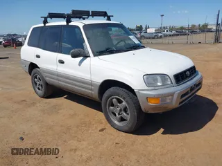 1998 Toyota RAV4 with VIN JT3HP10V0W7096832, listed as a IAAI auction lot 41900020 with 308,408 mi miles and . Bid and sale history available at DreamBid. Image 1.
