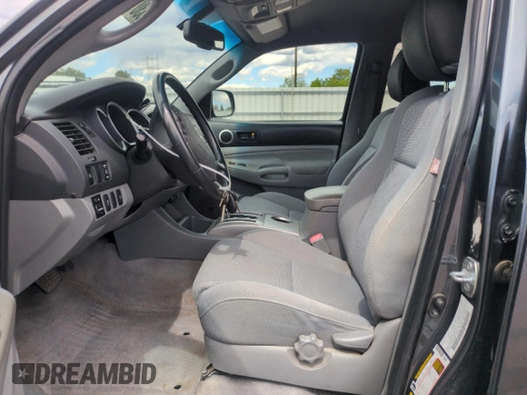 2009 Toyota Tacoma with VIN 3TMLU42N39M024000, listed as a Copart auction lot 55301375 with 210,068 mi miles and Salvage Title. Bid and sale history available at DreamBid. Image 7.