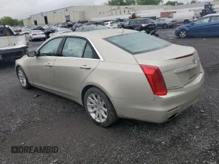 2014 Cadillac CTS Luxury AWD with VIN 1G6AX5SX0E0162681, listed as a Copart auction lot 55647855 with 45,426 mi miles and Salvage Title. Bid and sale history available at DreamBid. Image 2.