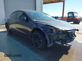 2018 Tesla Model 3 Long Range Battery with VIN 5YJ3E1EA8JF010834, listed as a IAAI auction lot 41598099 with 83,252 mi miles. Bid and sale history available at carsss.com. Image 1.