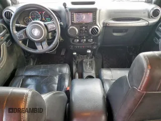 2012 Jeep Wrangler Unlimited Altitude with VIN 1C4HJWEGXCL180602, listed as a Copart auction lot 61391095 with 187,205 mi miles and Salvage title. Bid and sale history available at DreamBid. Image 8.