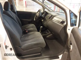 2009 Nissan Versa 1.8 S with VIN 3N1BC13E69L386083, listed as a IAAI auction lot 41717999 with 99,511 mi miles. Bid and sale history available at carsss.com. Image 5.