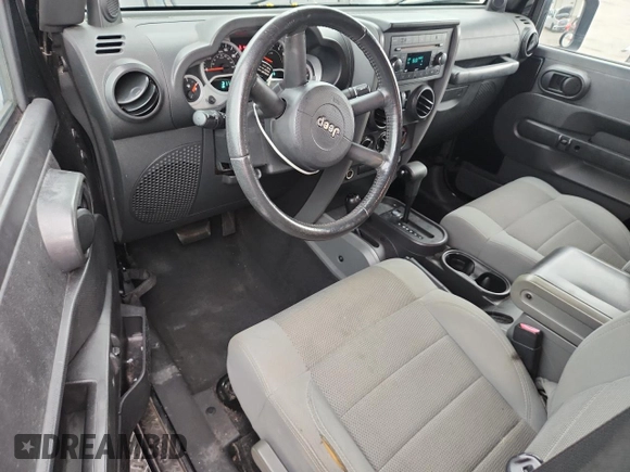 2007 Jeep Wrangler Sahara with VIN 1J8FA54117L172014, listed as a Copart auction lot 63131755 with 115,124 mi miles and Clean title. Bid and sale history available at DreamBid. Image 8.