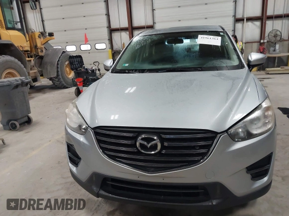 2016 Mazda CX-5 Sport with VIN JM3KE2BY2G0718434, listed as a IAAI auction lot 41961364 with 145,748 mi miles. Bid and sale history available at carsss.com. Image 12.
