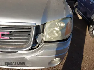 2004 GMC Envoy SLT with VIN 1GKDS13S942267554, listed as a IAAI auction lot 41754066 with 178,895 mi miles. Bid and sale history available at carsss.com. Image 6.