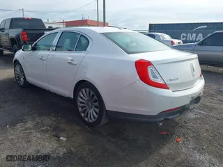2013 Lincoln MKS with VIN 1LNHL9DK4DG611684, listed as a IAAI auction lot 42043879 with 132,866 mi miles. Bid and sale history available at carsss.com. Image 3.