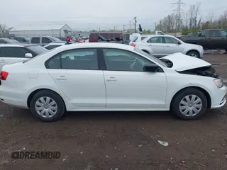 2015 Volkswagen Jetta Sedan 2.0L S with VIN 3VW2K7AJ5FM313969, listed as a IAAI auction lot 41951550 with 104,735 mi miles. Bid and sale history available at carsss.com. Image 13.