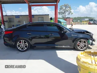 2013 Kia Optima SX z VIN 5XXGR4A69DG141426, wystawiony jako IAAI lot #41946366 z przebiegiem 75 937 mil mil oraz . Historia ofert i sprzedaży dostępna na DreamBid. Obrazek 14.