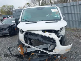 2020 Ford Transit Cargo with VIN 1FTYE1Y86LKA08570, listed as a IAAI auction lot 41571478 with 21,405 mi miles and . Bid and sale history available at DreamBid. Image 12.