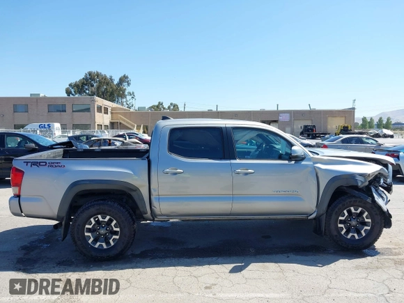2016 Toyota Tacoma SR5 z VIN 3TMAZ5CNXGM019256, wystawiony jako IAAI lot #42294477 z przebiegiem 123 680 mil mil oraz . Historia ofert i sprzedaży dostępna na DreamBid. Obrazek 13.