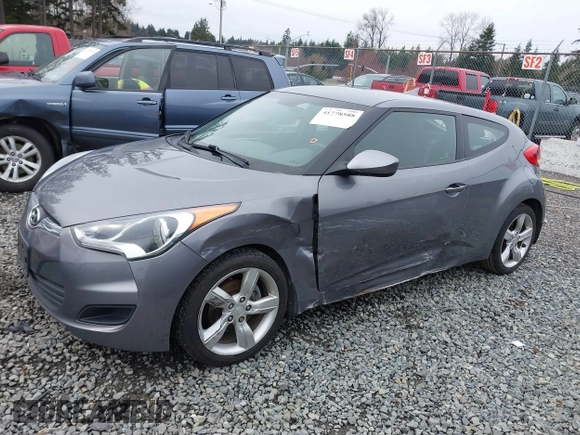 2012 Hyundai Veloster w/Gray Int z VIN KMHTC6AD7CU037130, wystawiony jako IAAI lot #41778588 z przebiegiem 125 549 mil mil oraz . Historia ofert i sprzedaży dostępna na DreamBid. Obrazek 14.