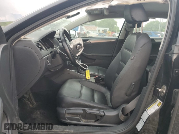 2015 Volkswagen Jetta SE with VIN 3VWD17AJXFM325546, listed as a Copart auction lot 62330395 with 119,727 mi miles and Salvage title. Bid and sale history available at DreamBid. Image 7.