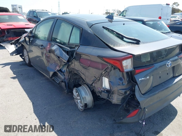 2020 Toyota Prius L Eco z VIN JTDKARFU3L3111990, wystawiony jako IAAI lot #41964834 z przebiegiem 67 873 mil mil oraz . Historia ofert i sprzedaży dostępna na DreamBid. Obrazek 6.