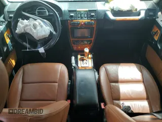 2004 Mercedes-Benz G with VIN WDCYR46E74X144672, listed as a Copart auction lot 55212454 with 143,994 mi miles and Salvage Title. Bid and sale history available at DreamBid. Image 8.