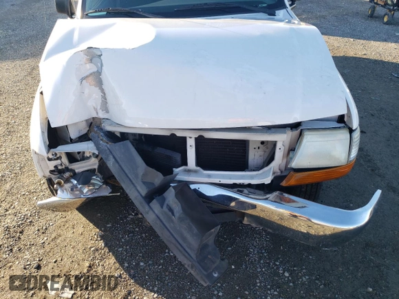 1999 Ford Ranger XLT with VIN 1FTYR10X8XUB20062, listed as a Copart auction lot 85779884 with 104,741 mi miles and Salvage title. Bid and sale history available at DreamBid. Image 11.