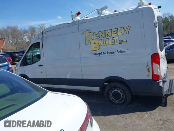 2015 Ford Transit Cargo z VIN 1FTNR2CM8FKB24259, wystawiony jako IAAI lot #42084952 z przebiegiem 124 520 mil mil oraz . Historia ofert i sprzedaży dostępna na DreamBid. Obrazek 14.