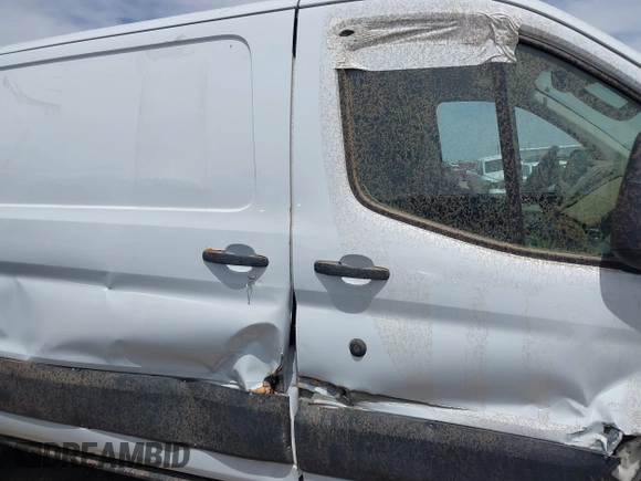 2018 Ford Transit Cargo with VIN 1FTYE1YG4JKA25467, listed as a IAAI auction lot 41738700 with 198,126 mi miles and . Bid and sale history available at DreamBid. Image 13.