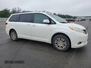 2016 Toyota Sienna XLE with VIN 5TDYK3DC8GS748036, listed as a Copart auction lot 60047235 with 147,203 mi miles and Salvage title. Bid and sale history available at DreamBid. Image 4.