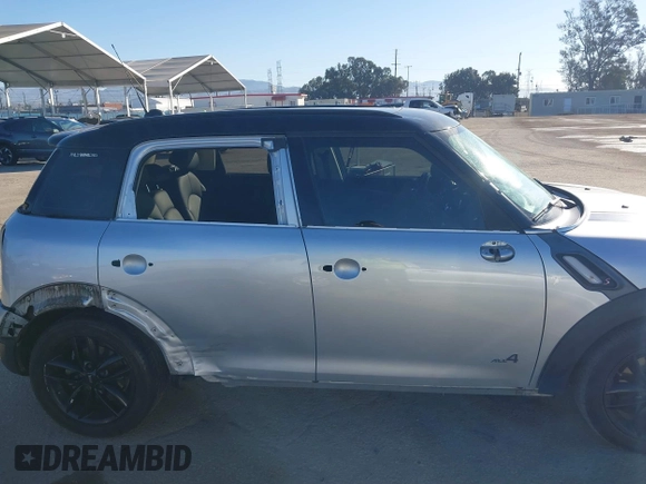2013 MINI Countryman S ALL4 with VIN WMWZC5C58DWP30774, listed as a IAAI auction lot 41637209 with 101,540 mi miles and . Bid and sale history available at DreamBid. Image 14.