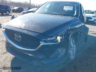 2021 Mazda CX-5 Grand Touring with VIN JM3KFBDM4M0471467, listed as a IAAI auction lot 41825406 with 43,529 mi miles. Bid and sale history available at carsss.com. Image 6.