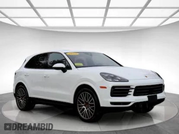2022 Porsche Cayenne z VIN WP1AA2AY2NDA06673, wystawiony jako Copart lot #42586635 z przebiegiem 17 392 mil mil oraz Czysty tytuł • Clean title. Historia ofert i sprzedaży dostępna na DreamBid. Obrazek 1.