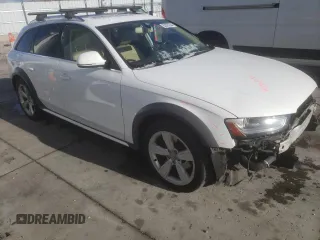 2015 Audi allroad Premium Plus with VIN WA1UFAFL0FA038560, listed as a Copart auction lot 82605264 with 128,158 mi miles and Salvage Title. Bid and sale history available at carsss.com. Image 4.
