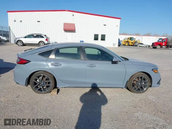 2022 Honda Civic Sport Touring z VIN 19XFL1G89NE009751, wystawiony jako IAAI lot #41845803 z przebiegiem Nie podano mil oraz . Historia ofert i sprzedaży dostępna na DreamBid. Obrazek 12.