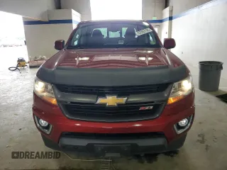 2020 Chevrolet Colorado 4WD Z71 z VIN 1GCGTDENXL1111901, wystawiony jako Copart lot #57093195 z przebiegiem 60 992 mil mil oraz Szkoda całkowita • Salvage title. Historia ofert i sprzedaży dostępna na DreamBid. Obrazek 5.