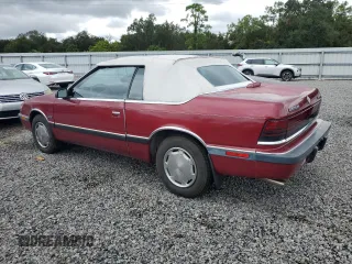 1989 Chrysler LeBaron z VIN 1C3XJ45J8KG223051, wystawiony jako Copart lot #75115464 z przebiegiem 27 923 mil mil oraz Szkody całkowita. Historia ofert i sprzedaży dostępna na DreamBid. Obrazek 2.