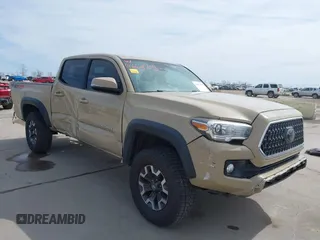 2018 Toyota Tacoma SR with VIN 3TMCZ5AN6JM153006, listed as a IAAI auction lot 41662705 with 176,659 mi miles. Bid and sale history available at carsss.com. Image 1.