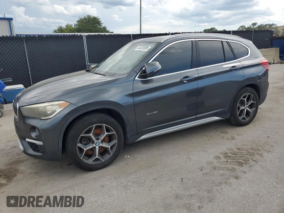 2017 BMW X1 xDrive28i with VIN WBXHT3C32H5F75870, listed as a Copart auction lot 64420385 with 158,640 mi miles and Clean title. Bid and sale history available at DreamBid. Image 1.