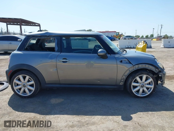 2007 MINI Hardtop S with VIN WMWMF73597TL86892, listed as a IAAI auction lot 42157544 with 93,097 mi miles and . Bid and sale history available at DreamBid. Image 14.