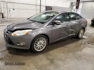 2012 Ford Focus SEL with VIN 1FAHP3H29CL386660, listed as a Copart auction lot 51447905 with 210,075 mi miles and Salvage Title. Bid and sale history available at carsss.com. Image 1.