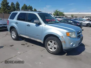 2009 Ford Escape Hybrid z VIN 1FMCU49319KB30484, wystawiony jako IAAI lot #42160753 z przebiegiem 104 669 mil mil oraz . Historia ofert i sprzedaży dostępna na DreamBid. Obrazek 1.