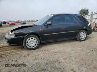 1998 Subaru Impreza L with VIN JF1GF4354WG805257, listed as a Copart auction lot 73696134 with 141,441 mi miles and Salvage title. Bid and sale history available at DreamBid. Image 1.