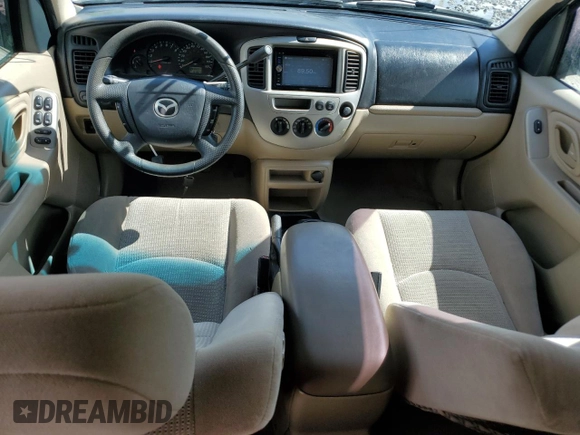 2003 Mazda Tribute LX with VIN 4F2CZ94133KM19916, listed as a Copart auction lot 73718284 with 151,644 mi miles and Salvage Title. Bid and sale history available at DreamBid. Image 8.