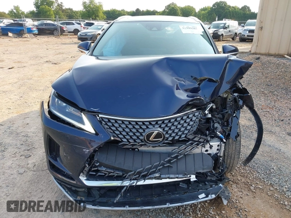 2022 Lexus RX 350 with VIN 2T2HZMAA5NC232352, listed as a IAAI auction lot 42399381 with 13,359 mi miles and . Bid and sale history available at DreamBid. Image 6.
