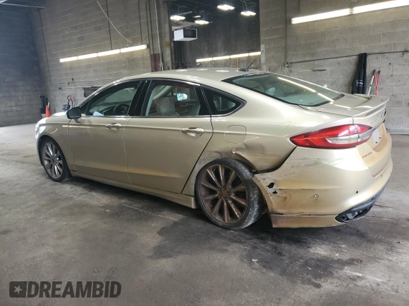 2017 Ford Fusion Titanium z VIN 3FA6P0K96HR132389, wystawiony jako Copart lot #57312665 z przebiegiem Nie podano mil oraz Szkoda całkowita • Salvage title. Historia ofert i sprzedaży dostępna na DreamBid. Obrazek 2.