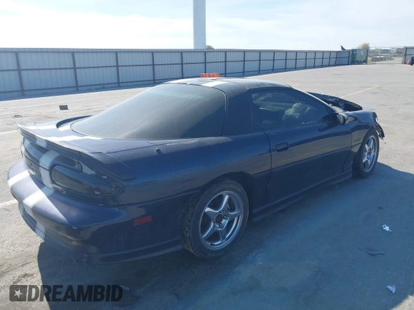 2001 Chevrolet Camaro Z28 z VIN 2G1FP22G312146719, wystawiony jako IAAI lot #42228792 z przebiegiem 134 142 mil mil oraz . Historia ofert i sprzedaży dostępna na DreamBid. Obrazek 4.