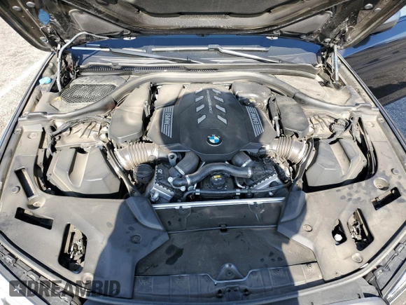 2022 BMW 5 Series M550i xDrive z VIN WBA13BK03NCK95022, wystawiony jako Copart lot #58600105 z przebiegiem 34 142 mil mil oraz Szkoda całkowita • Salvage title. Historia ofert i sprzedaży dostępna na DreamBid. Obrazek 11.