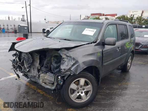 2011 Honda Pilot EX with VIN 5FNYF3H49BB026174, listed as a IAAI auction lot 41795460 with 201,488 mi miles and . Bid and sale history available at carsss.com. Image 2.