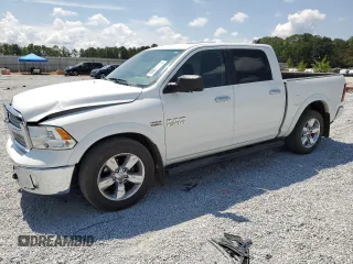 2018 Ram 1500 Lone Star Silver z VIN 1C6RR6LTXJS149809, wystawiony jako Copart lot #64846924 z przebiegiem 122 882 mil mil oraz Szkoda całkowita • Salvage title. Historia ofert i sprzedaży dostępna na DreamBid. Obrazek 1.