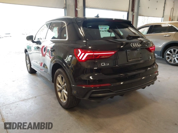 2021 Audi Q3 S line Premium Plus with VIN WA1EECF32M1054629, listed as a IAAI auction lot 41588322 with 33,385 mi miles and . Bid and sale history available at DreamBid. Image 3.