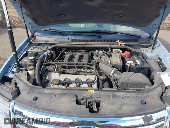 2008 Ford Taurus SEL with VIN 1FAHP27WX8G157077, listed as a IAAI auction lot 41499882 with 113,039 mi miles. Bid and sale history available at carsss.com. Image 10.