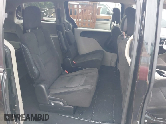 2013 Dodge Grand Caravan SXT with VIN 2C4RDGCG0DR552784, listed as a IAAI auction lot 42116395 with 96,917 mi miles and . Bid and sale history available at DreamBid. Image 8.