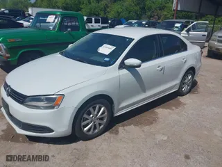 2014 Volkswagen Jetta Sedan SE with VIN 3VWD07AJ2EM310654, listed as a IAAI auction lot 41997453 with 126,801 mi miles. Bid and sale history available at carsss.com. Image 2.