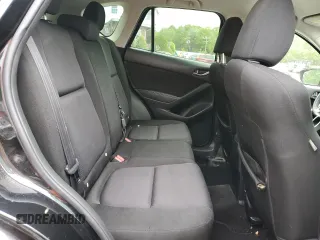 2014 Mazda CX-5 Sport z VIN JM3KE4BE1E0416423, wystawiony jako Copart lot #58196705 z przebiegiem 177 294 mil mil oraz Czysty tytuł • Clean title. Historia ofert i sprzedaży dostępna na DreamBid. Obrazek 11.